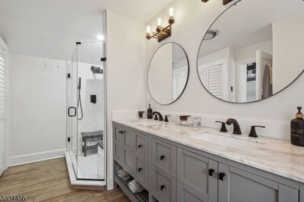 Bathroom, Dual Sink Vanities, Glass Shower, Interior, Wood Texture Flooring