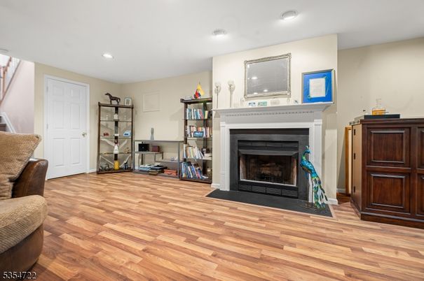 Fireplace, Interior, Recessed Lighting, Wood Texture Flooring