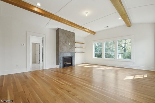 Empty room, Fireplace, Interior, Recessed Lighting, Wooden Beams, Wood Texture Flooring