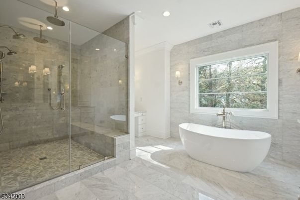 Bathroom, Free Standing Baths, Glass Shower, Interior, Marble, Marble Walls, Recessed Lighting