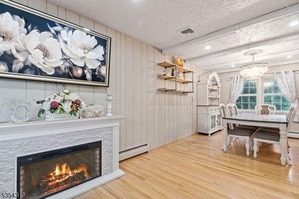 Chandelier, Dining room, Fireplace, Interior, Recessed Lighting, Wood Texture Flooring