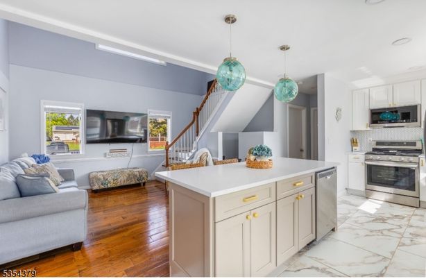Interior, Kitchen, Living room, Marble, Pendant Lights, Recessed Lighting, Stainless Steel Appliances, Wood Texture Flooring
