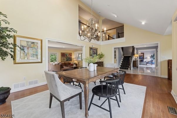 Chandelier, Dining room, Interior, Living room, Recessed Lighting, Wood Texture Flooring