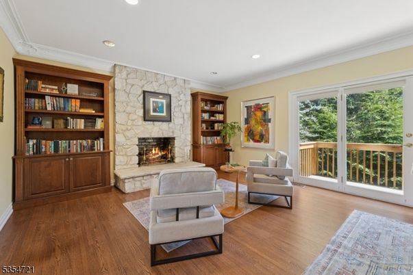 Fireplace, Interior, Living room, Recessed Lighting, Stone Walls, Wood Texture Flooring