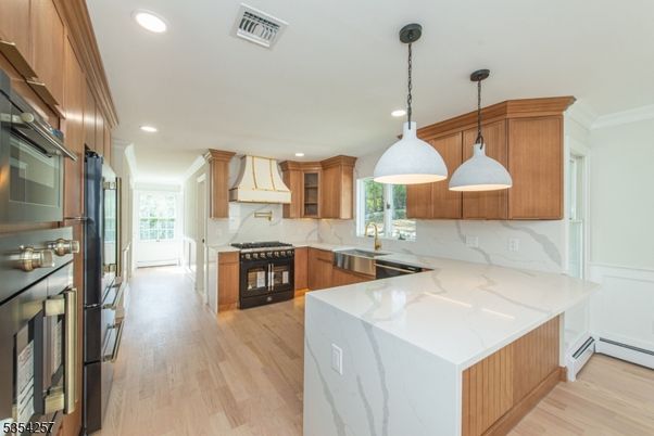 Interior, Kitchen, Marble Walls, Pendant Lights, Recessed Lighting, Wood Texture Flooring