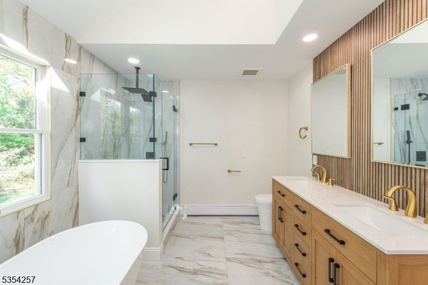 Bathroom, Dual Sink Vanities, Free Standing Baths, Glass Shower, Interior, Marble, Marble Walls, Recessed Lighting