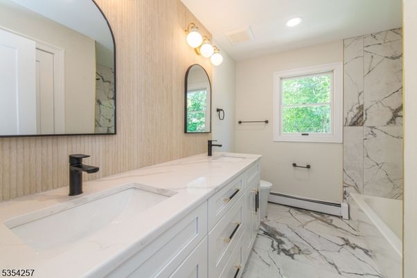 Bathroom, Dual Sink Vanities, Interior, Marble, Marble Walls, Recessed Lighting