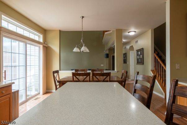 Dining room, Interior, Pendant Lights, Wood Texture Flooring