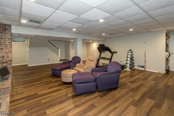Fitness Equipment, Interior, Recessed Lighting, Stone Walls, Wood Texture Flooring