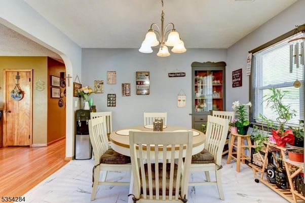 Chandelier, Dining room, Interior, Wood Texture Flooring