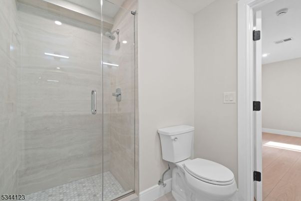 Bathroom, Glass Shower, Interior, Recessed Lighting, Wood Texture Flooring