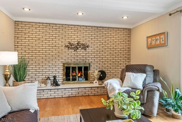 Fireplace, Interior, Recessed Lighting, Stone Walls, Wood Texture Flooring