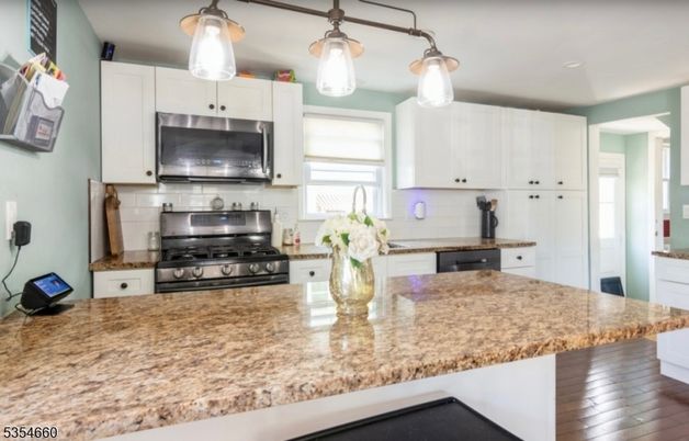 Interior, Kitchen, Pendant Lights, Stainless Steel Appliances, Wood Texture Flooring