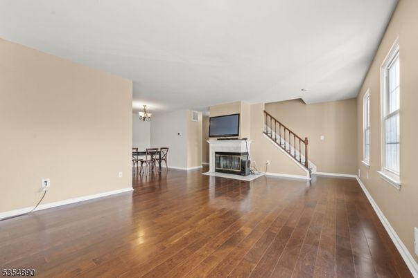 Chandelier, Dining room, Empty room, Fireplace, Interior, Wood Texture Flooring