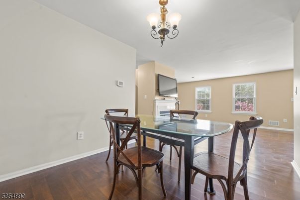 Chandelier, Dining room, Fireplace, Interior, Wood Texture Flooring