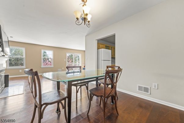 Chandelier, Dining room, Fireplace, Interior, Wood Texture Flooring