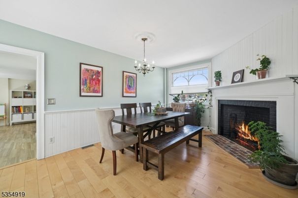 Chandelier, Dining room, Fireplace, Interior, Wood Texture Flooring