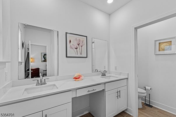 Bathroom, Dual Sink Vanities, Interior, Recessed Lighting, Wood Texture Flooring