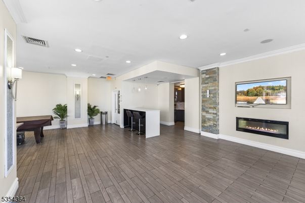 Billiard Table, Fireplace, Game Room, Interior, Pendant Lights, Recessed Lighting, Wood Texture Flooring