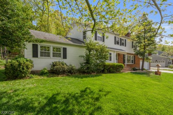 Attached, Backyard, Exterior, Facade, Brick Facade, Cape Cod