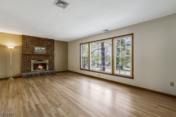 Empty room, Fireplace, Interior, Stone Walls, Wood Texture Flooring
