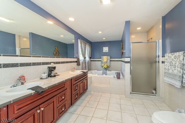 Bathroom, Dual Sink Vanities, Glass Shower, Interior, Recessed Lighting, Tile Countertops