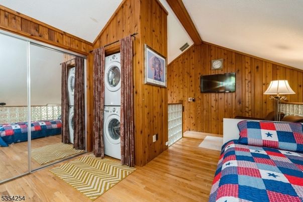 Interior, Utility Closets, Washer, Wood Texture Flooring, Wooden Walls