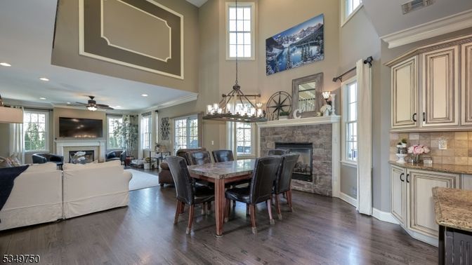 Chandelier, Dining room, Fireplace, Interior, Living room, Recessed Lighting, Wood Texture Flooring