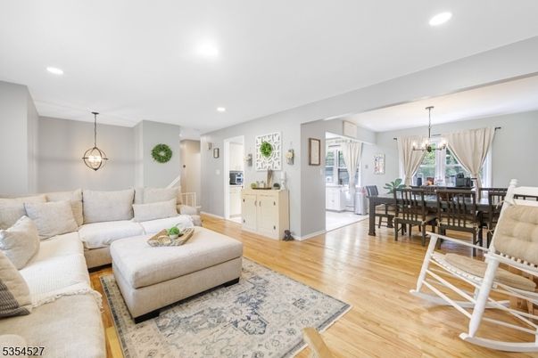 Chandelier, Dining room, Interior, Living room, Pendant Lights, Recessed Lighting, Wood Texture Flooring