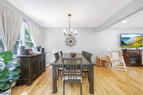 Chandelier, Dining room, Fireplace, Interior, Recessed Lighting, Wood Texture Flooring