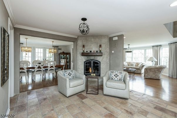 Chandelier, Dining room, Fireplace, Interior, Living room, Pendant Lights, Wood Texture Flooring