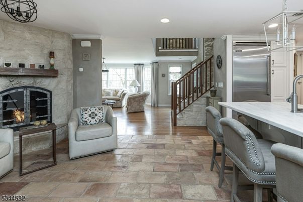 Fireplace, Interior, Kitchen, Recessed Lighting, Stainless Steel Appliances, Wood Texture Flooring