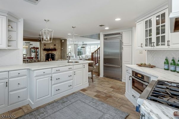 Fireplace, Interior, Kitchen, Pendant Lights, Recessed Lighting, Stainless Steel Appliances