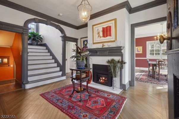 Dining room, Fireplace, Interior, Pendant Lights, Wood Texture Flooring