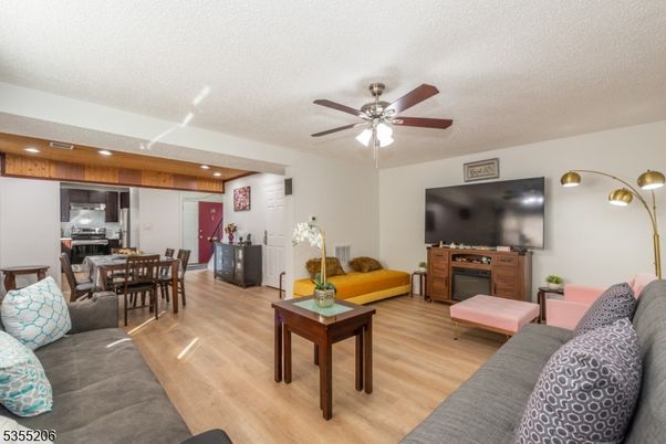 Dining room, Interior, Kitchen, Living room, Recessed Lighting, Stainless Steel Appliances, Wood Texture Flooring