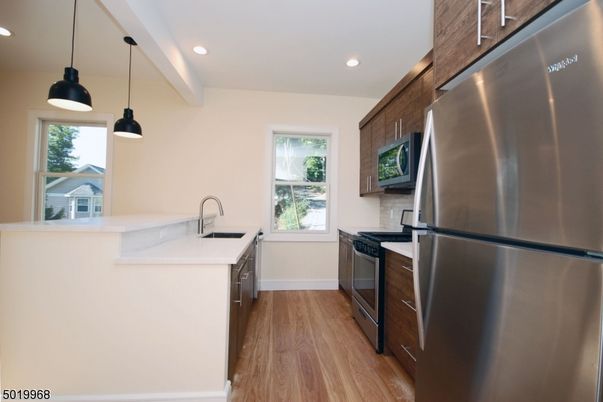 Interior, Kitchen, Pendant Lights, Recessed Lighting, Stainless Steel Appliances, Wood Texture Flooring
