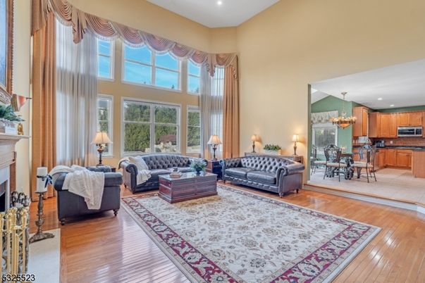 Chandelier, Dining room, Fireplace, Interior, Kitchen, Living room, Recessed Lighting, Wood Texture Flooring