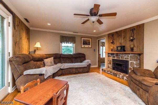 Fireplace, Interior, Living room, Recessed Lighting, Wood Texture Flooring, Wooden Walls