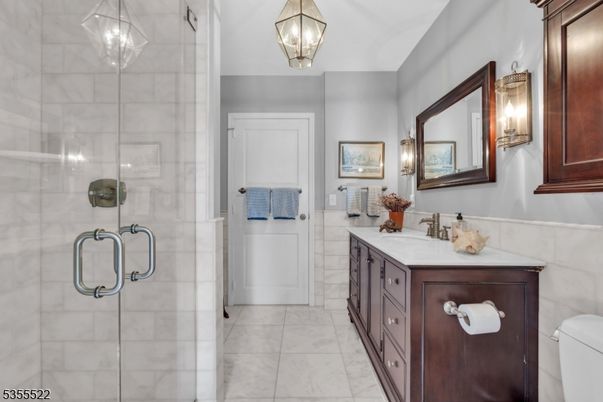 Bathroom, Dual Sink Vanities, Glass Shower, Interior, Marble, Pendant Lights