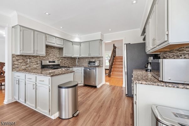 Interior, Kitchen, Recessed Lighting, Stainless Steel Appliances, Wood Texture Flooring
