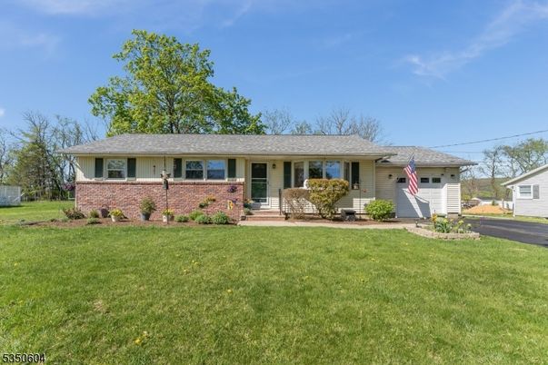 Attached, Backyard, Exterior, Facade, Brick Facade, Ranch