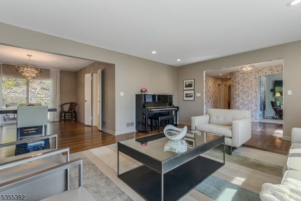 Chandelier, Dining room, Interior, Living room, Piano, Recessed Lighting, Wood Texture Flooring
