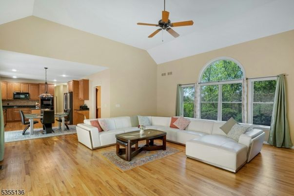 Dining room, Interior, Kitchen, Living room, Recessed Lighting, Stainless Steel Appliances, Wood Texture Flooring
