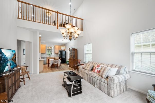 Chandelier, Dining room, Interior, Kitchen, Living room, Pendant Lights, Recessed Lighting, Wood Texture Flooring