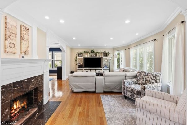 Fireplace, Interior, Living room, Recessed Lighting, Wood Texture Flooring
