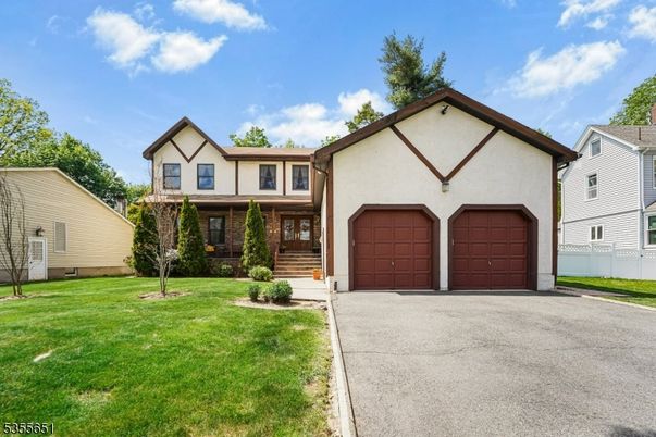Attached, Exterior, Facade, Tudor Revival