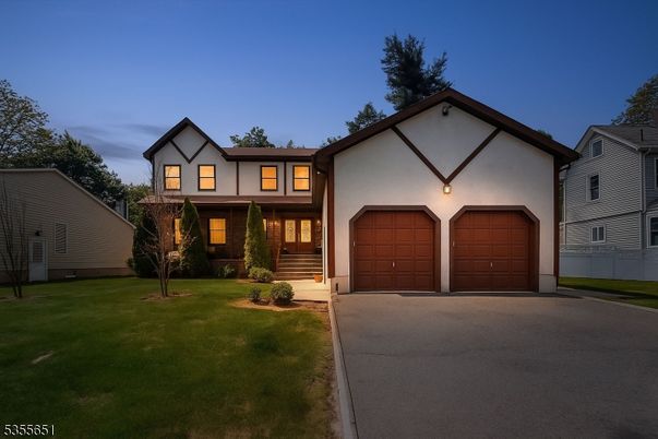Attached, Exterior, Facade, Tudor Revival