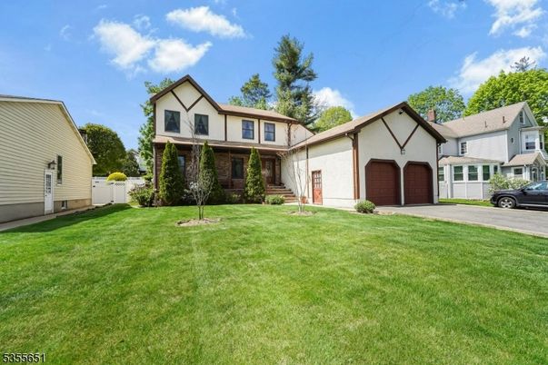 Attached, Backyard, Exterior, Facade, Tudor Revival