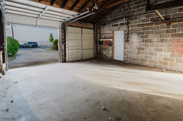 Garage, Interior, Stone Walls, Wooden Beams