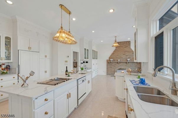 Fireplace, Interior, Kitchen, Pendant Lights, Recessed Lighting, Stainless Steel Appliances, Stone Walls